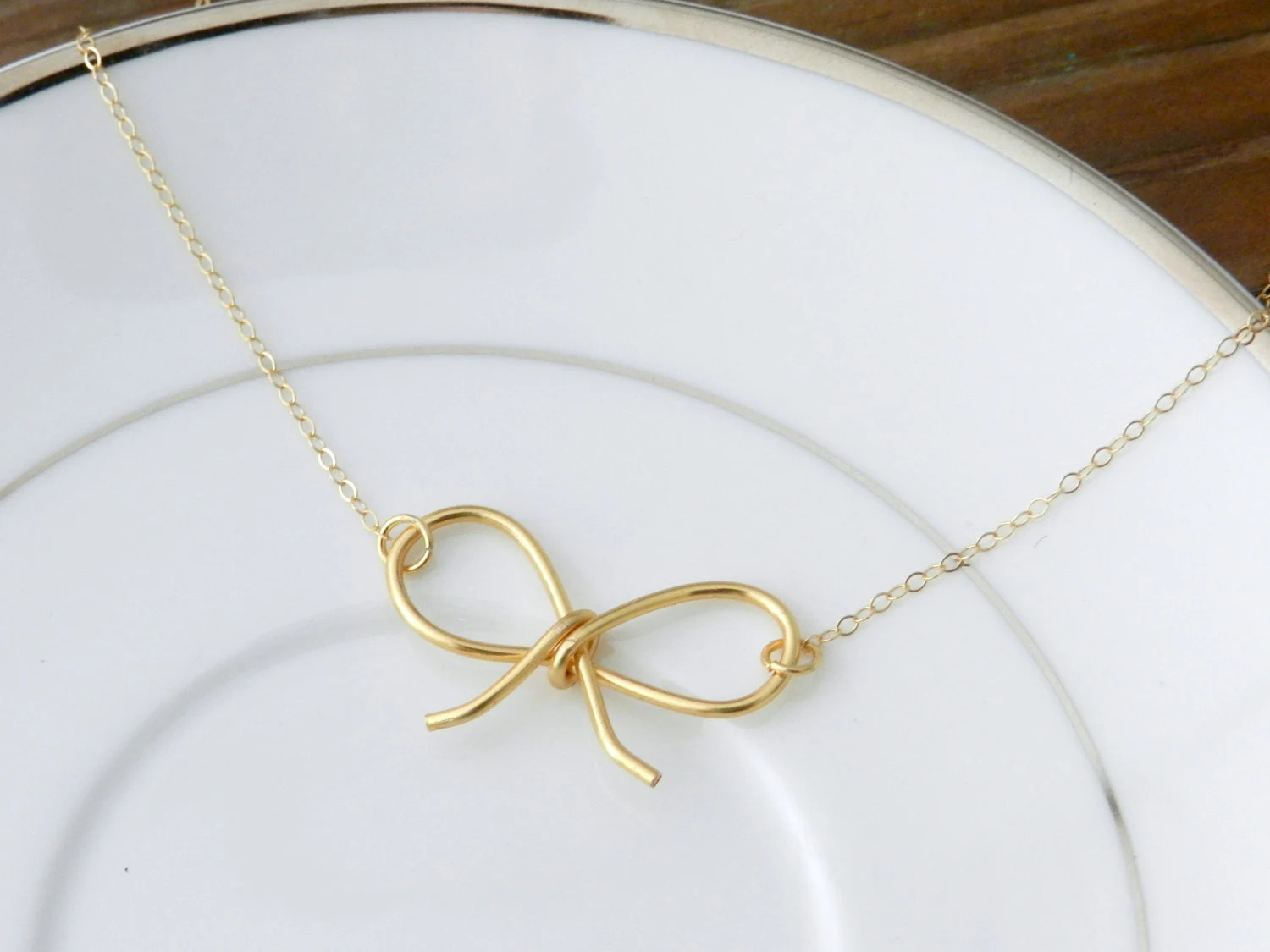 Darling Bow necklace. 14k gold filled.